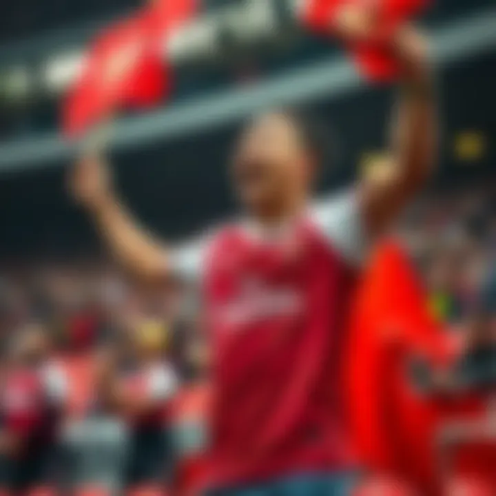 A passionate Arsenal supporter wearing a jersey, waving a flag, and cheering at a match.