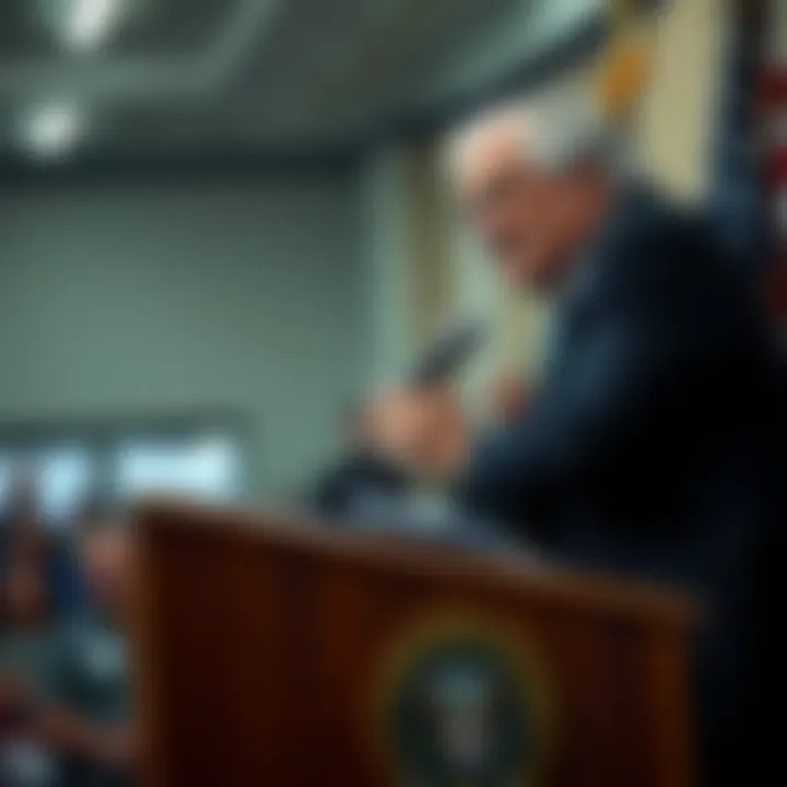 Congressman White speaking at a podium, emphasizing the threat of asset seizure over munitions factories on the Northern Slope, with concerned audience members in the background.