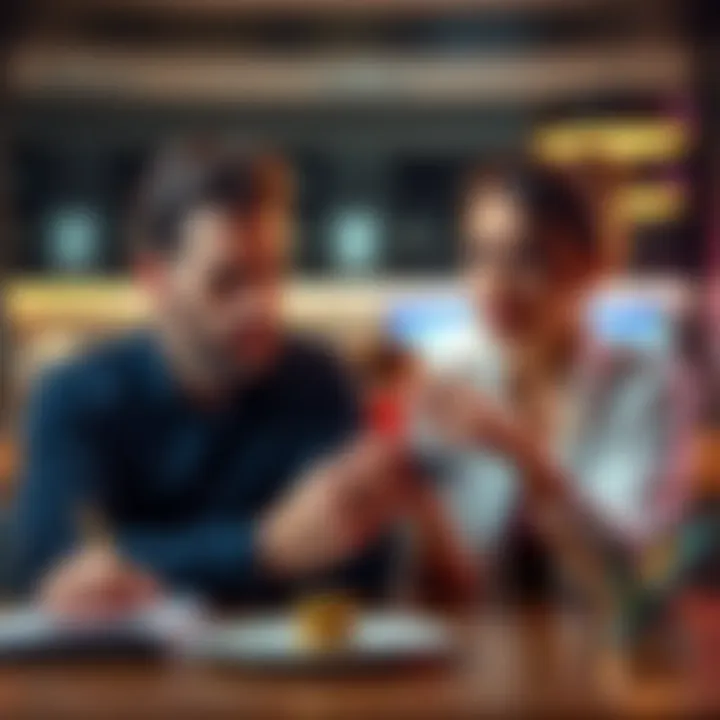 A man and woman sit at a table, looking at a credit card and discussing financial matters with a concerned expression.