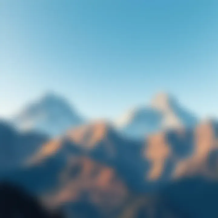 A vibrant view of recognizable mountain peaks against a clear sky, showcasing nature's beauty.