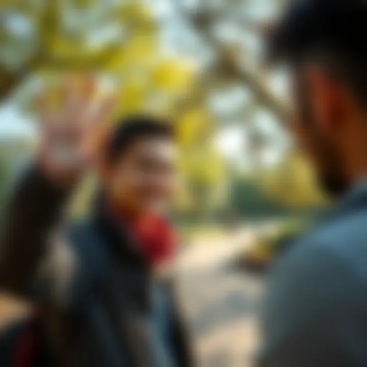 A person smiling and waving hello to another person in a park setting, emphasizing friendly communication.