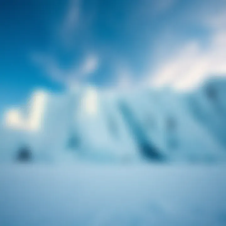 Ice Wall in a Frozen Landscape A towering ice wall surrounded by snow-covered ground and clear blue skies, showcasing the effects of climate change.