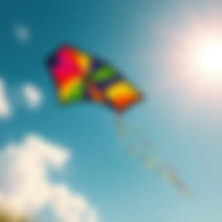 A colorful kite soaring high in the blue sky, showcasing its artistic design and vibrant colors during a sunny day.