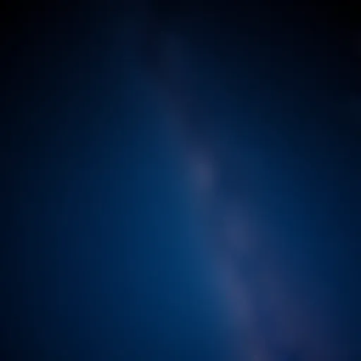 A clear night sky filled with bright stars and a hint of the Milky Way, representing the beauty of stargazing for free.