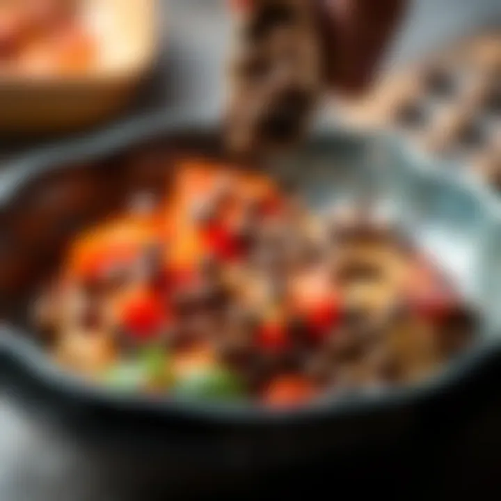 A close-up of fresh peppercorns being added to a vibrant dish, showcasing the spice's importance in cooking.