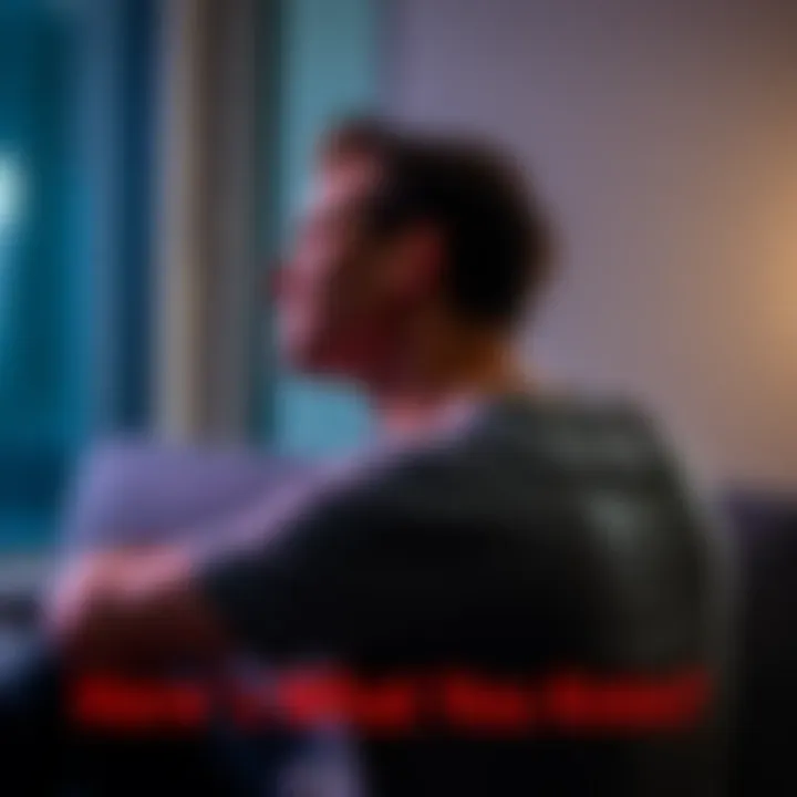 Person holding their neck in discomfort A person sitting on a couch, holding their neck with a pained expression, indicating neck pain.