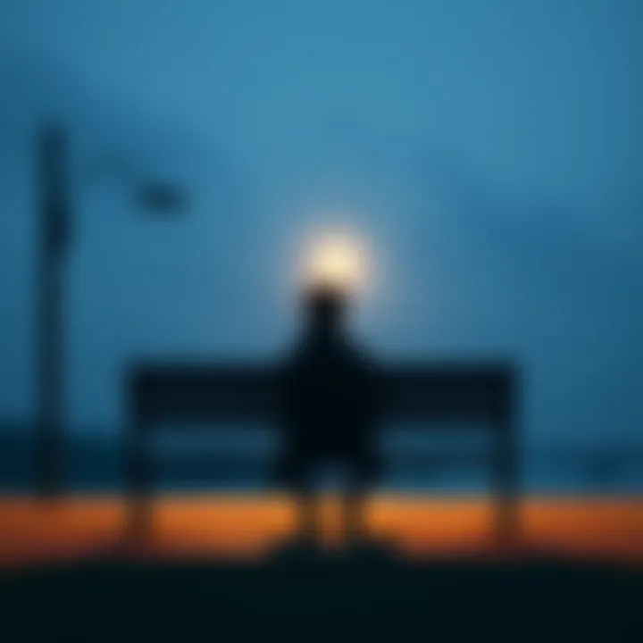 A person sitting alone on a park bench, looking thoughtful and contemplative, surrounded by empty space.