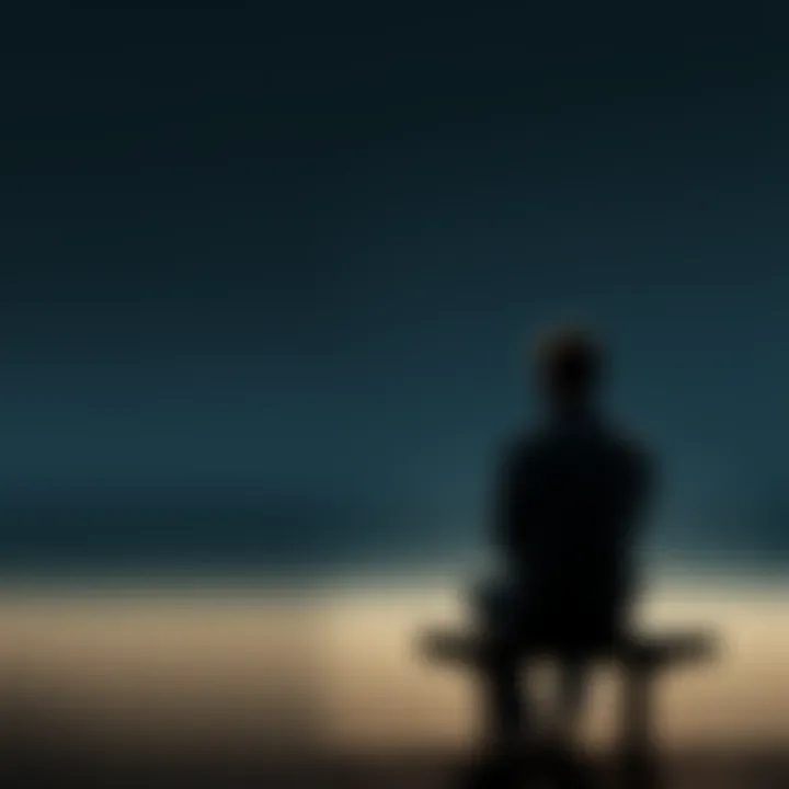A person sitting on a bench with a downcast expression, surrounded by empty space, reflecting feelings of rejection and loneliness.