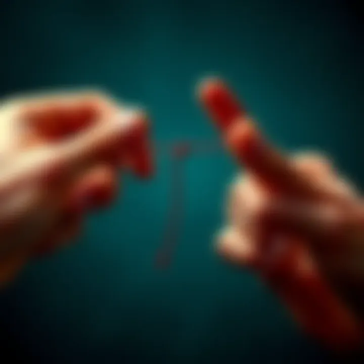 Two hands with a red string tied around the pinky fingers, symbolizing connection and fate.
