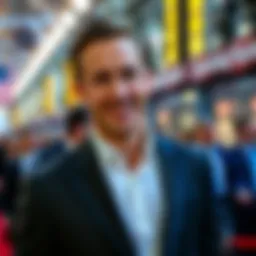 Ryan Gosling smiling at a movie premiere, wearing a stylish suit