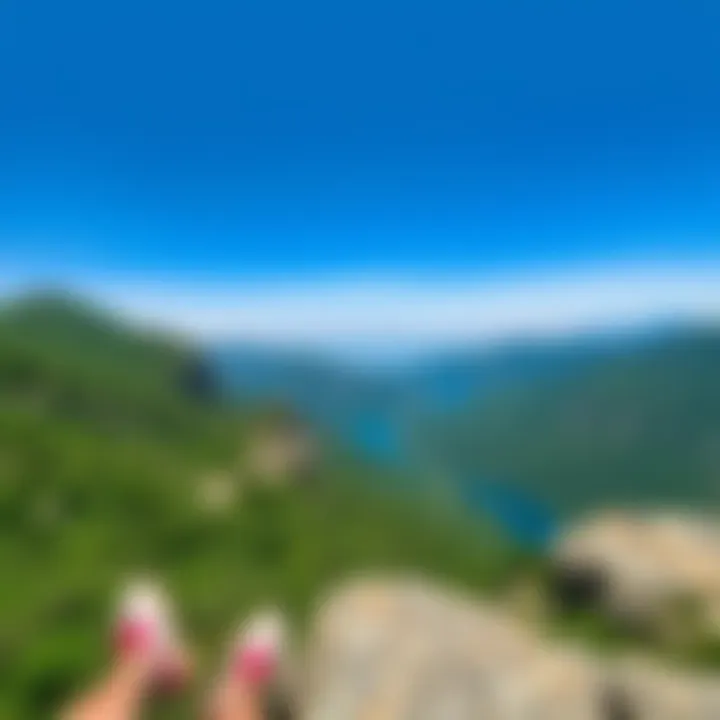 A panoramic view of Holy Peak showing lush greenery, rocky slopes, and a clear blue sky, perfect for outdoor activities.