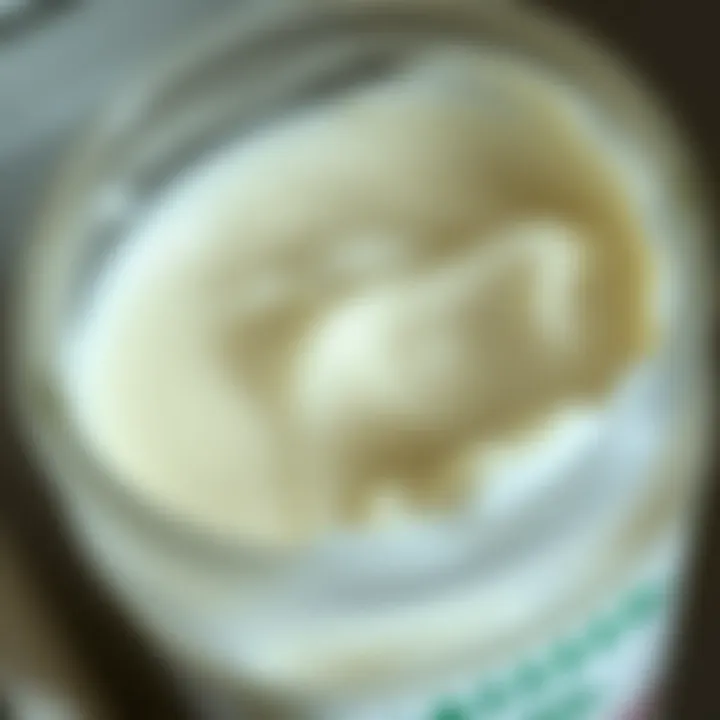 A close-up of a container of milk with a spoiled appearance, showing curdled texture and a faded label, symbolizing aging and deterioration.