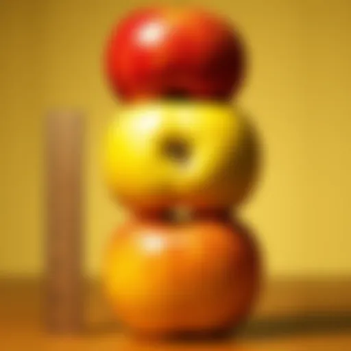 Two and a half apples stacked on top of each other with a ruler beside them for height comparison
