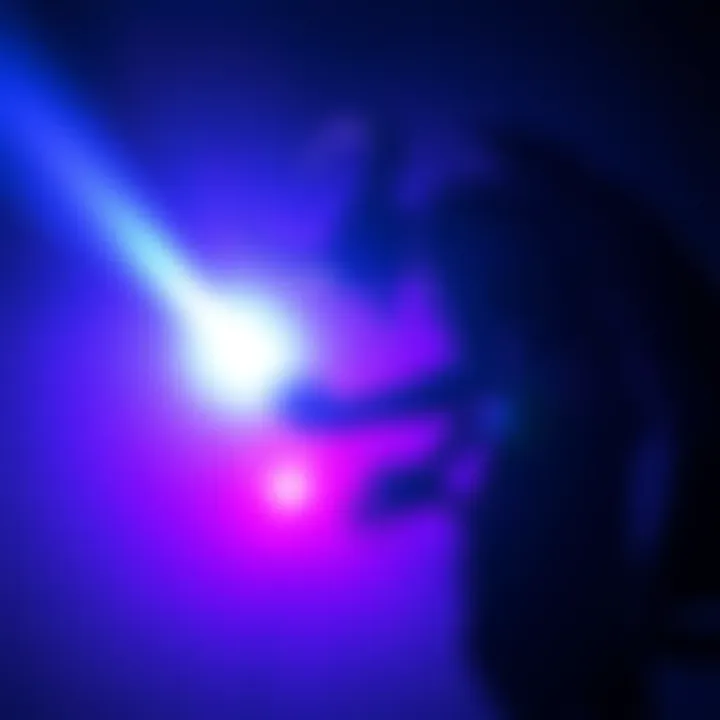 A bright ultraviolet light beam shining on a dark silhouette of a demon, representing a battle between light and darkness.