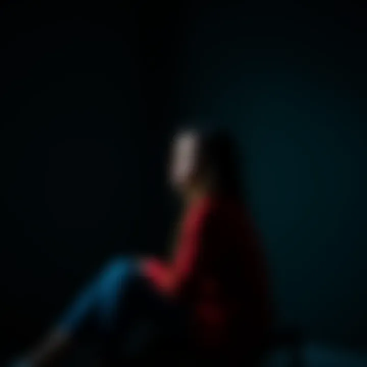 A woman sitting alone in a quiet room, looking thoughtful and contemplative, representing silent emotional struggles